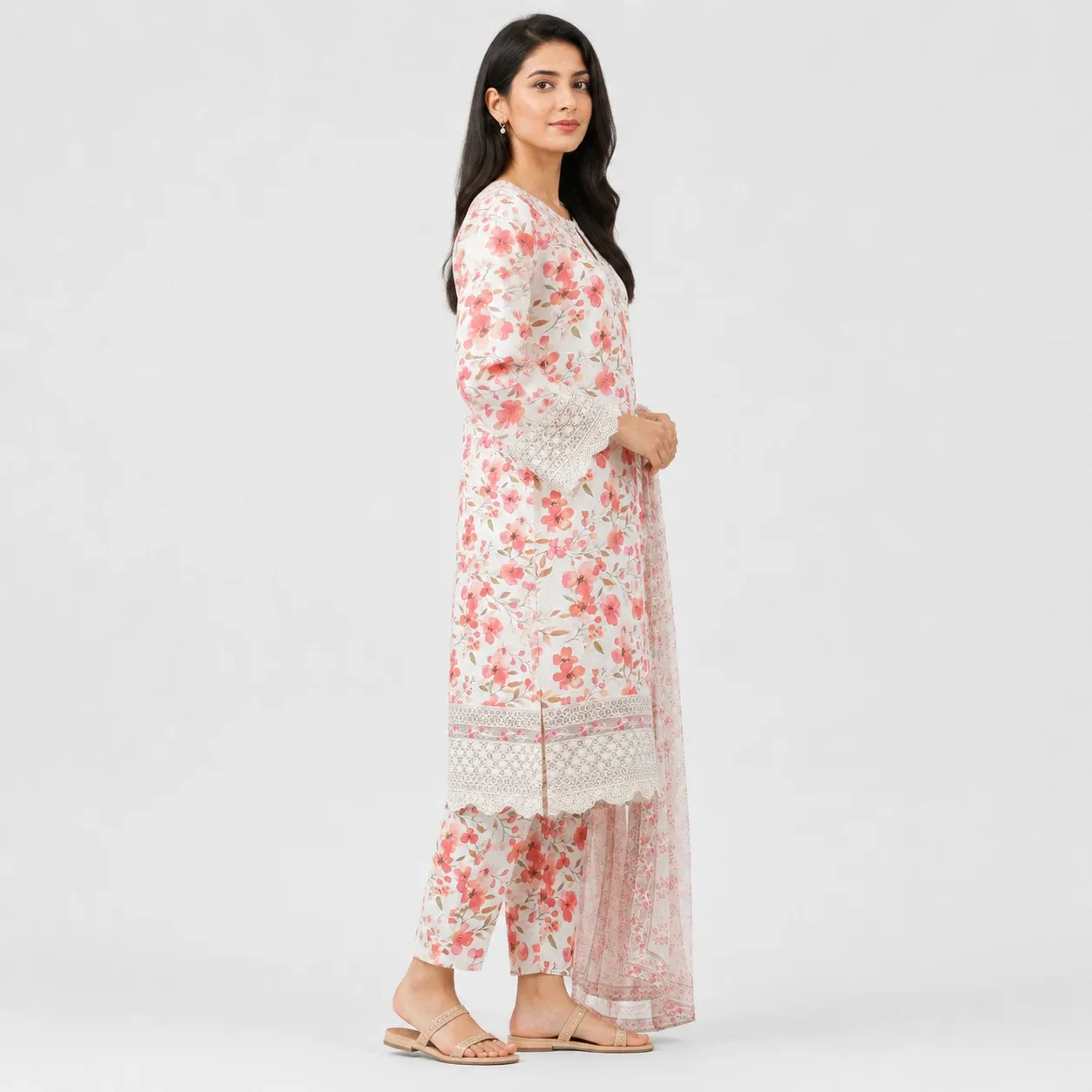 Shop Floral Printed Lawn 3 Piece Suit for Women with matching trouser and dupatta, featuring delicate floral prints, elegant borders and lightweight fabric for comfortable summer and casual wear.