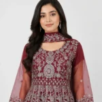 Embroidered Party Wear Maxi for women with floral embroidery, sheer sleeves, full-length flare and scalloped hem