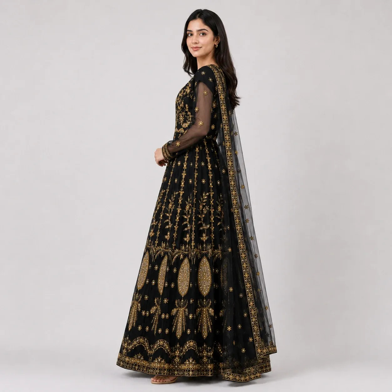Women embroidered net maxi dress with gold embroidery, full flare, sheer sleeves, and matching net dupatta